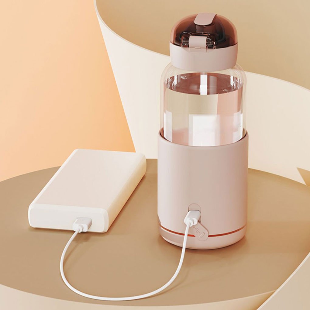 Chauffe-biberon nomade rose pastel avec contrôle de température