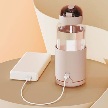 Chauffe-biberon nomade rose pastel avec contrôle de température