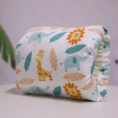 coussin d'allaitement lions et éléphants