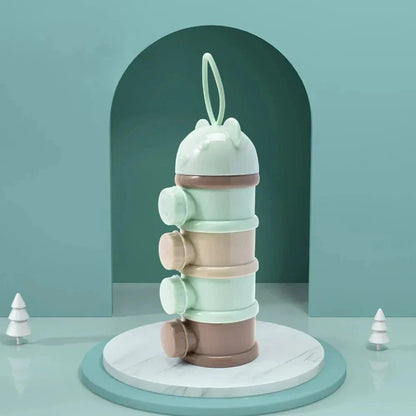 doseur de lait indispensable babypowderbox vert